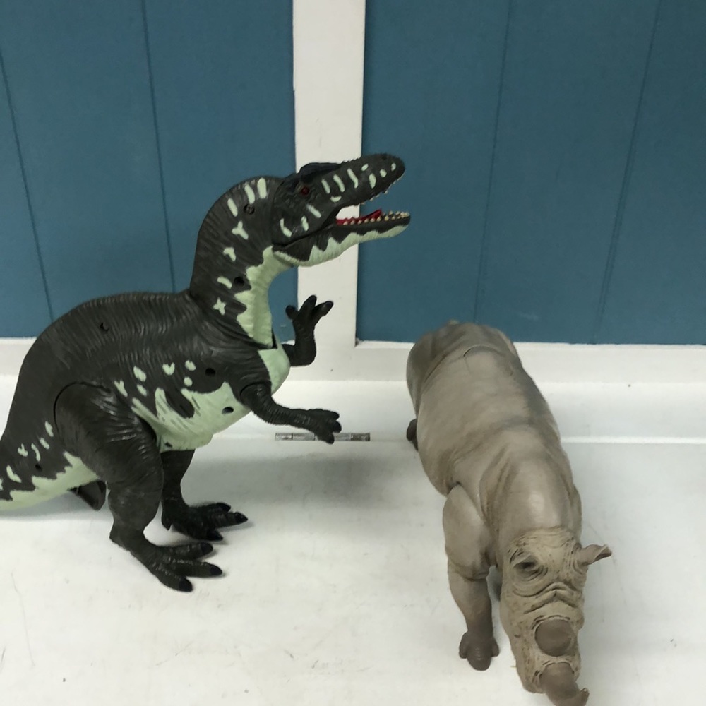 15” Light up mouth growling dinosaur & moveable 11” white rhino with sound toys